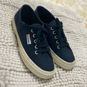 Superga. Wore once around the house.